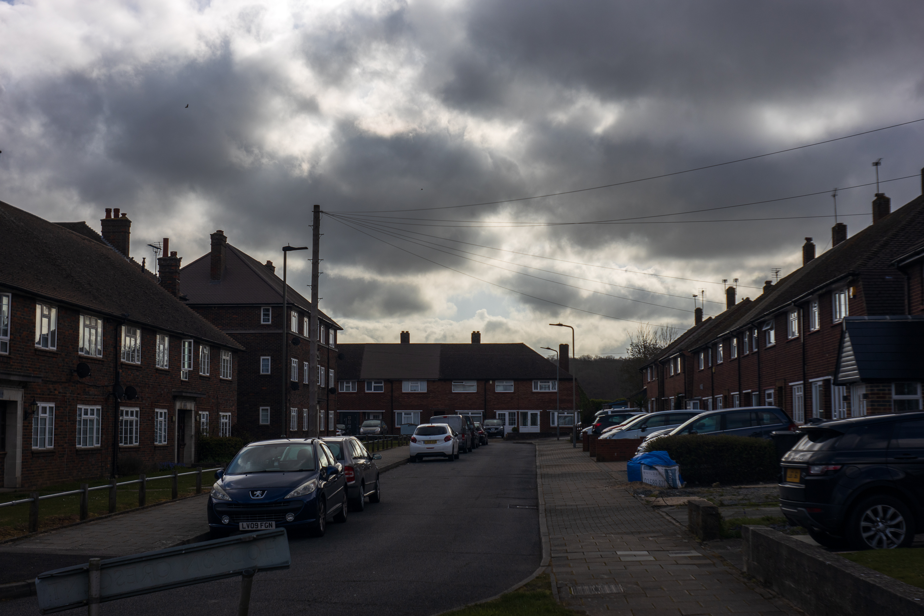 Street view with houses and cars