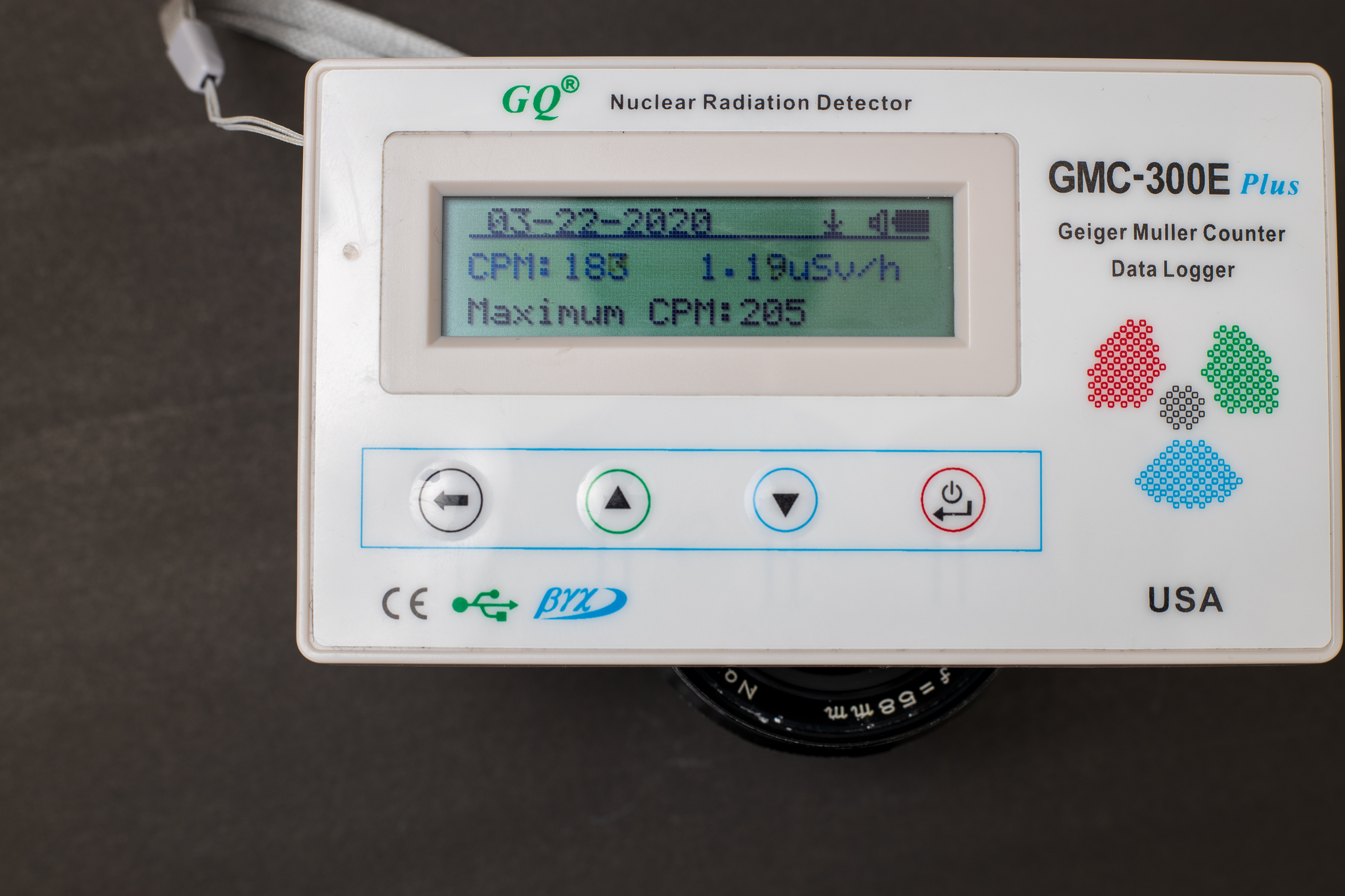 Geiger counter registering 1.19 uSv/h for front of Mamiya Sekor 58mm f1.7 M42