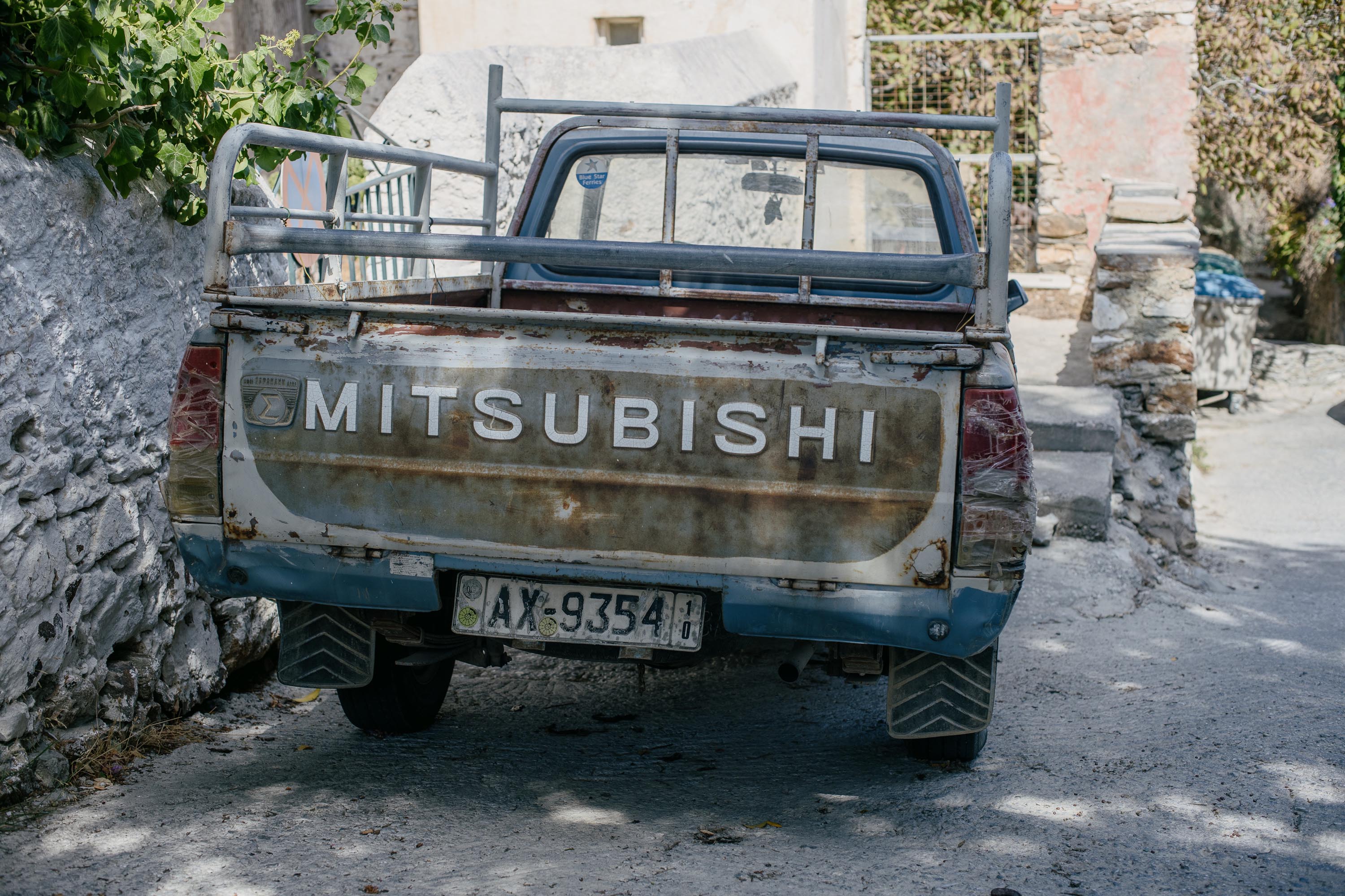 Even run-down Mitsubishi truck looks good with this lens