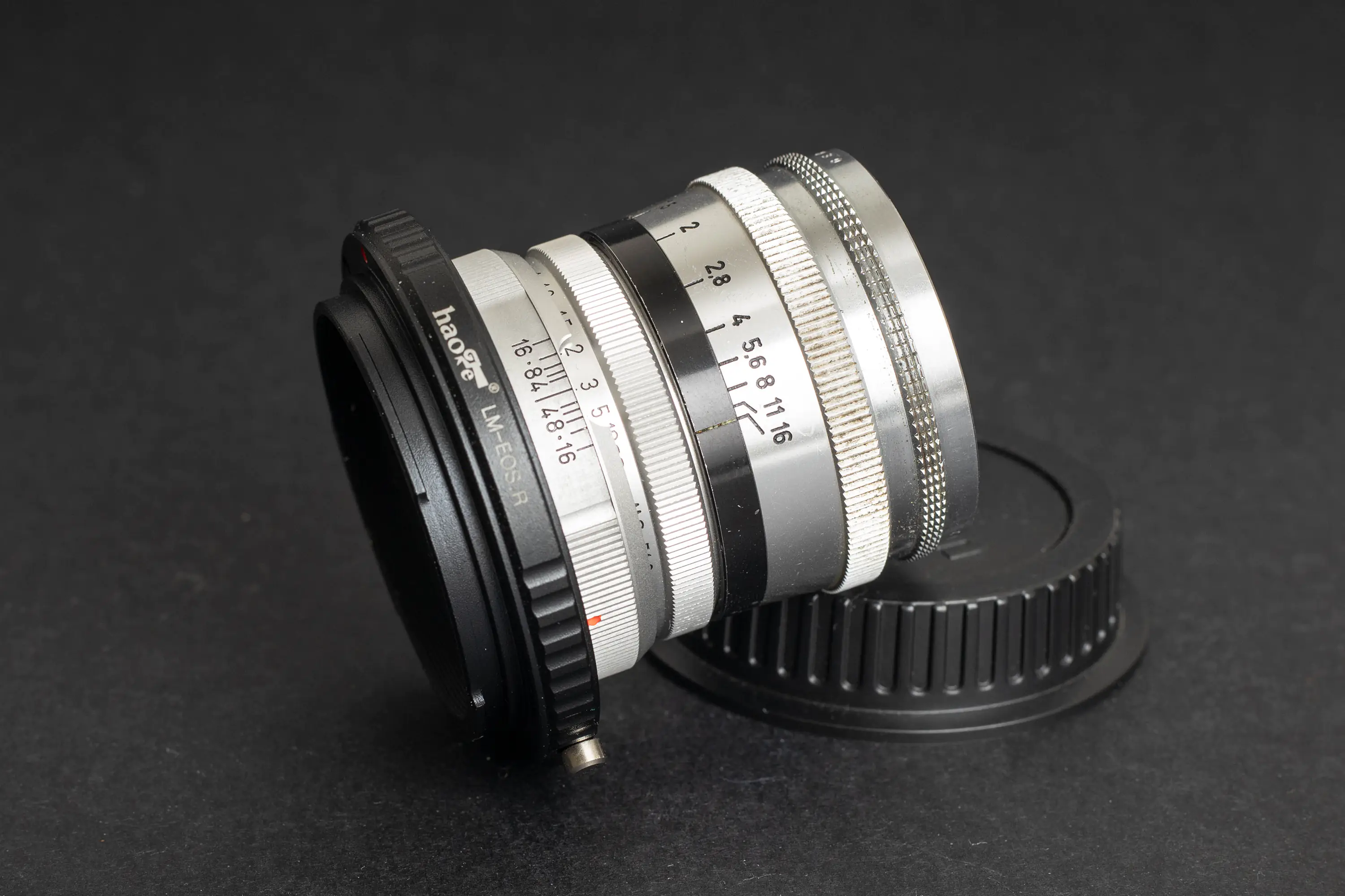 Voigtlander Nokton 50mm f1.5 with the two adapters, allowing the use of the lens on the Canon EOS R.