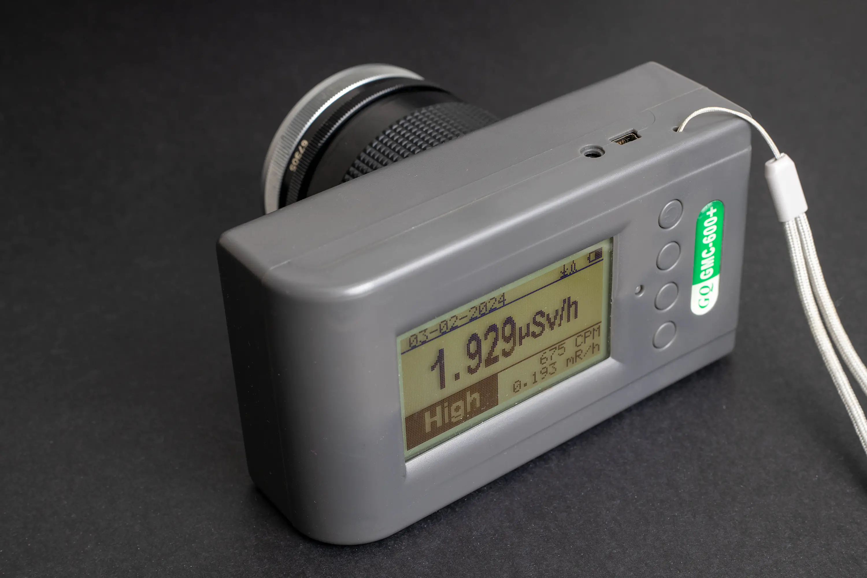 Geiger counter is showing 1.9 uSv/h at the front element of Canon FD 35mm f2